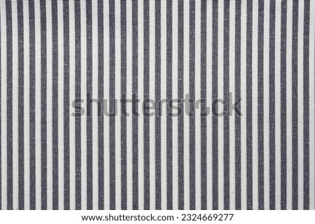Blue and white striped fabric texture.