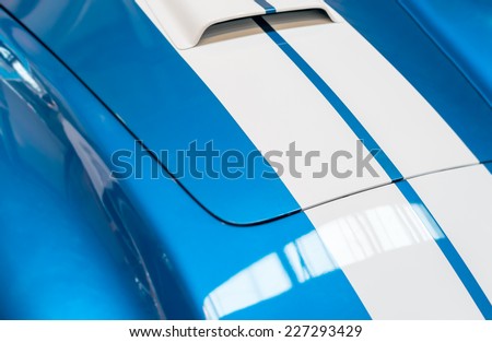 Blue and White Striped Hood with Hood Vent of Classic Car