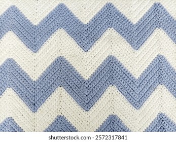 Blue and White Zig-Zag Pattern Crochet Tablecloth on Background