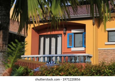 blue windows on the colorful house