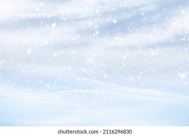 BLUE WINTER BACKGROUND WITH SNOW, SNOWFLAKES AND ICE AT FROSTY WEATHER, CHRISTMAS BACKDROP BACKGROUND FOR MONTAGE PRODUCTS AND PRESENTS