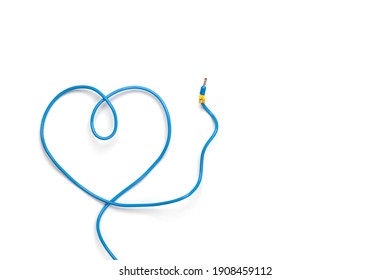 Blue wire bent in the shape of heart on white background with copy space. A symbol of male sexuality. A symbol of love via the Internet.
