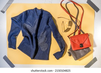 Blue Women's Sweater And Two Handbags On Yellow Background Top View