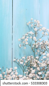 Blue Wood Background And Winter Flowes Pattern

