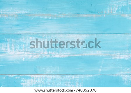 Blue wood texture background surface with old natural pattern or old wood texture table top view. Grunge surface with wood texture background. Vintage timber texture background. Rustic table top view.
