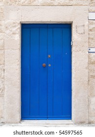 Blue wooden frontdoor.
