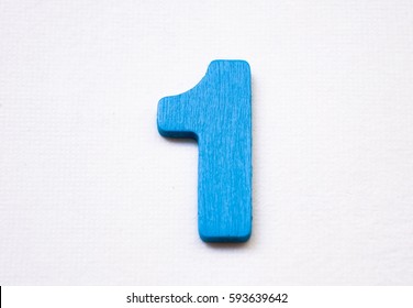 Blue wooden of number one isolated on white background.