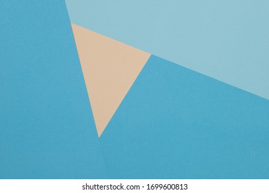 Blue and yellow background, colored paper geometrically divides into zones - Shutterstock ID 1699600813