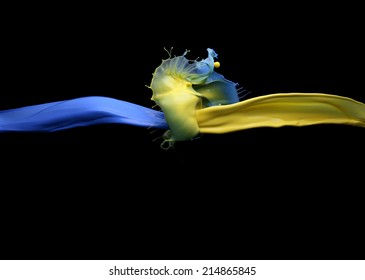  Blue And Yellow Paint On A Black Background 