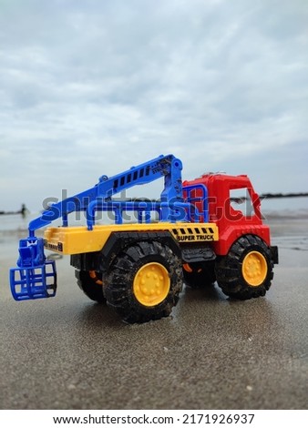 Blue Yellow and Red Toys Super Truck at Beach, Bulldozer Toys Plastic, Dumptruck toys in the beach