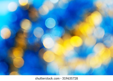 Blue Yellow White Bokeh. Christmas Background Texture