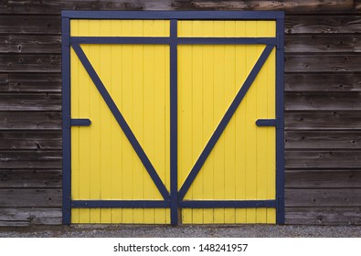 Blue Yellow Wooden Barn Door