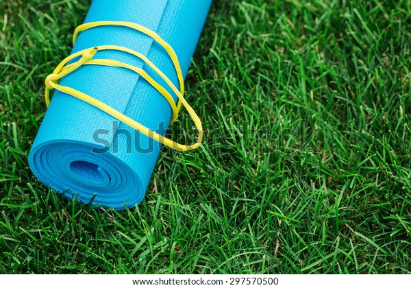 Blue Yoga Mat On Green Grass Stock Photo Edit Now 297570500