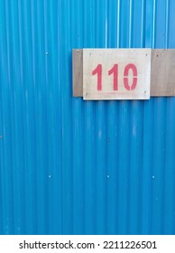 Blue Zinc Fence With Wave Pattern