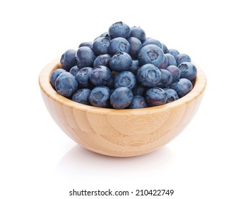 Blueberries in bowl. Isolated on white background