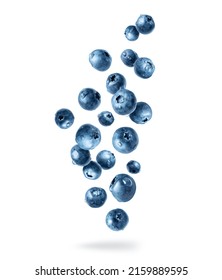 Blueberries with dew drops in the air isolated on a white background - Shutterstock ID 2159889595
