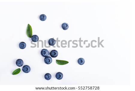 Blueberries and leaves isolated on white background