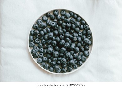 Blueberries In Modern Ceramic Plate Flat Lay. Summertime In Countryside. Healthy Food Aesthetics. Summer Berries On Soft Linen Background, Moody Banner