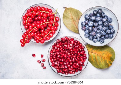 Blueberries, Pomegranate And Red Currant Top View.Healthy Antioxidant Food.