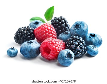 Blueberries, raspberries and blackberries isolated on white background. Close up, high resolution product. Harvest Concept