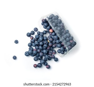 Blueberries scattered from a plastic box isolated. Blueberry, forest blue berry, bluberry pile , bilberry, fresh blueberries, huckleberry on white background top view