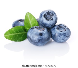 Blueberries and two leaves isolated on white background - Shutterstock ID 71702377