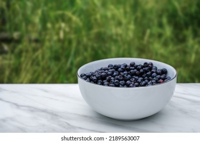 Blueberries In A White Plate Side View Close-up