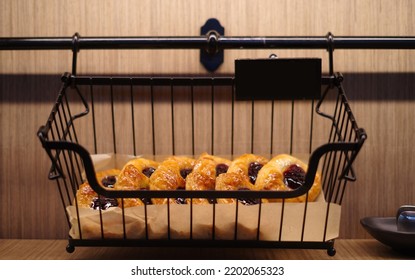 Blueberry Bread In A Black Basket.