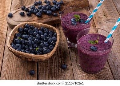 Blueberry Cocktail (smothie) In A Glass On A Rustic Wooden Background. 