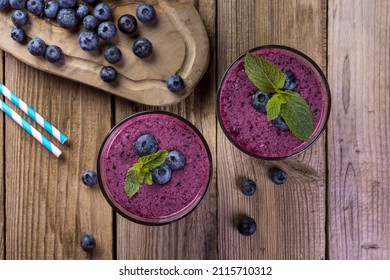 Blueberry Cocktail (smothie) In A Glass On A Rustic Wooden Background. 