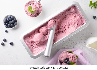 Blueberry Homemade Ice Cream In Metallic Tub On White Background. View From Above. Clean Eating. Without Sugar.