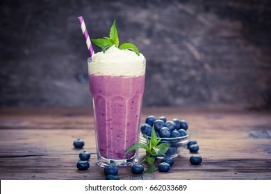 Blueberry Milkshake With Whipped Cream