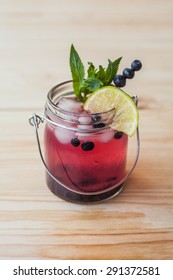 Blueberry Mojito On A Wooden Desk