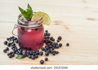 Blueberry Mojito On A Wooden Desk