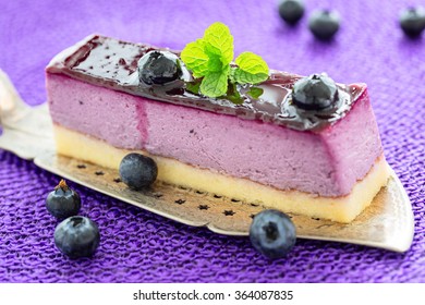 Blueberry Mouse Cake On Old Antique Cake Slicer 