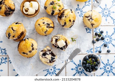 Blueberry Muffins With Fresh Berries And Blueberry Preserves Served With Butter