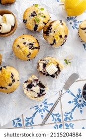 Blueberry Muffins With Fresh Berries And Blueberry Preserves Served With Butter