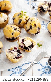 Blueberry Muffins With Fresh Berries And Blueberry Preserves Served With Butter