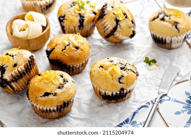 Blueberry Muffins With Fresh Berries And Blueberry Preserves Served With Butter