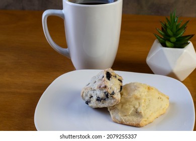 Blueberry And Orange Scone Served With A Cup Of Coffee