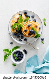 Blueberry Pancakes With Fresh Berries On Breakfast Table