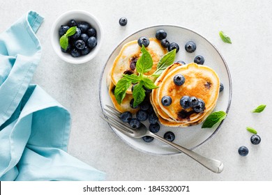 Blueberry Pancakes With Fresh Berries On Breakfast Table