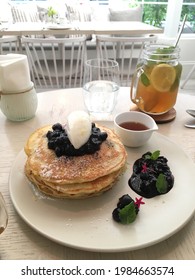 Blueberry Pancakes And Lemon Tea For Breakfast