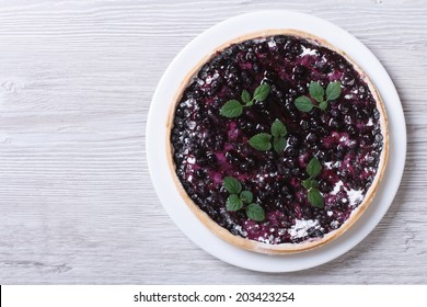 Blueberry Pie With Mint On Wooden Background. Top View Horizontal 