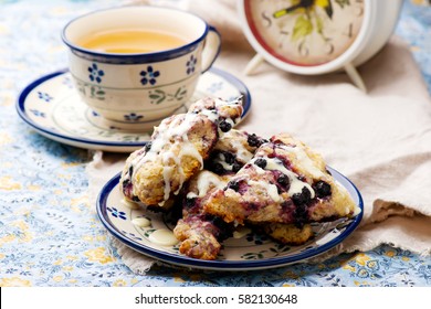 Blueberry Scone  With Cinnamon Cream Cheese Glaze.selective Focus