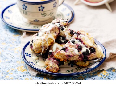 Blueberry Scone  With Cinnamon Cream Cheese Glaze.selective Focus