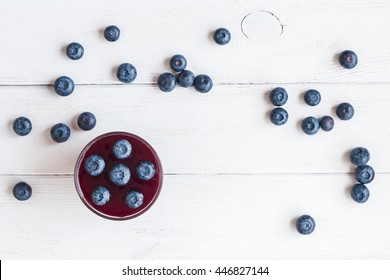 Blueberry Smoothie On Wooden White Background, Top View, Flat Lay