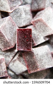 Blueberry And Strawberry Pate De Fruit (jelly, Marmalade, Fruit Candy) Covered With Powder Sugar. The Photo Of A Texture Inside Of Pate De Fruit.