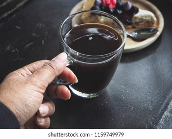 Blueberry tart and black coffee cup - Shutterstock ID 1159749979