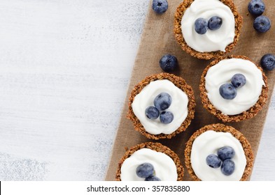 Blueberry Tarts On A Wooden Platter, Healthy Dessert Tart Snack